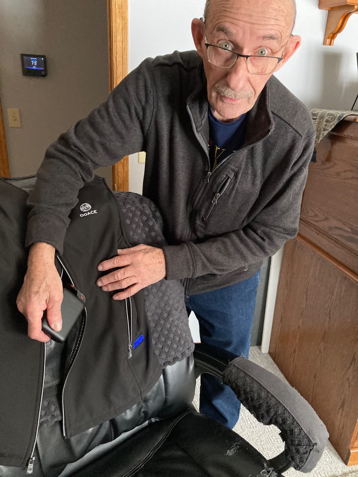 Compact, don't know it is there and IT REALLY, REALLY WORKS with my vest to keep OLD man Warm !